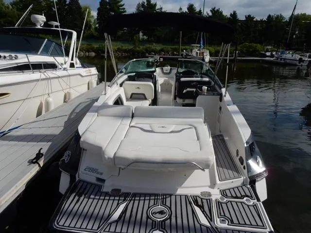 Slide: The Image of 2014 Monterey 288 Super Sport boat docked at marina, rear view. - 18