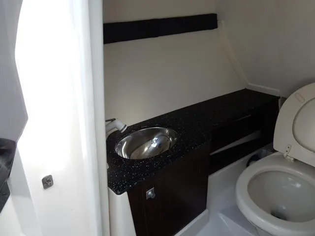 Slide: The Image of 2014 Monterey 288 Super Sport boat bathroom with sink and toilet. - 36
