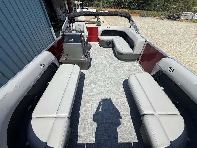 Slide: The Image of 2026 Sun Tracker PARTY BARGE® 16 DLX interior with spacious seating and modern design. - 14