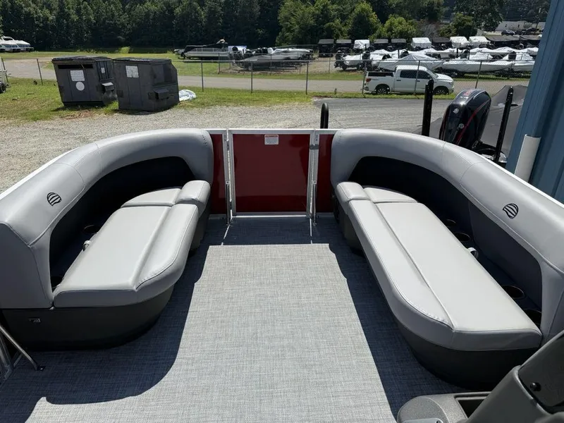 Slide: The Image of 2026 Sun Tracker PARTY BARGE® 16 DLX pontoon boat with spacious seating and modern design. - 4