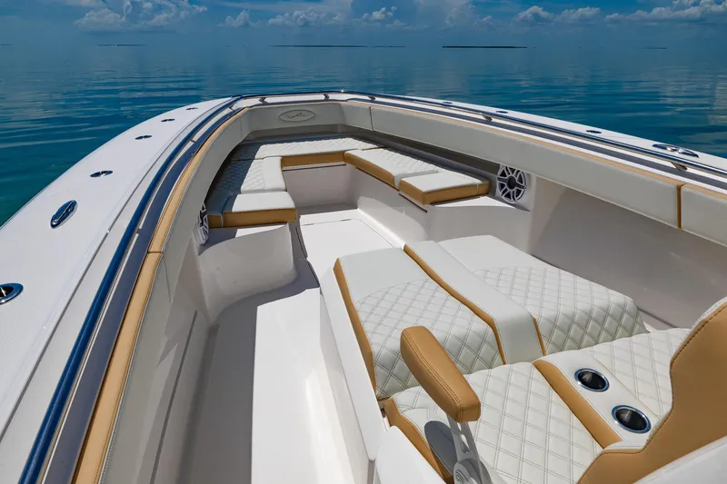 Slide: The Image of 2024 Blackwater 43 Sportfish boat interior with luxurious seating and ocean view. - 13