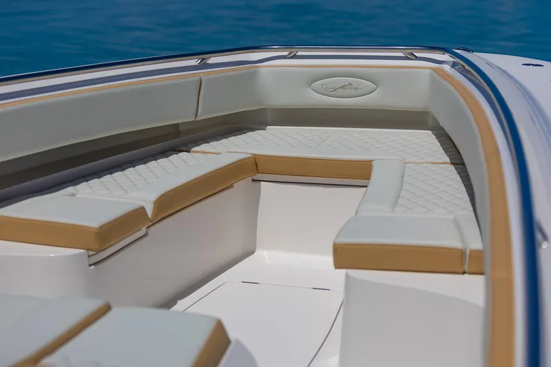 Slide: The Image of 2024 Blackwater 43 Sportfish boat interior with cushioned seating. - 23
