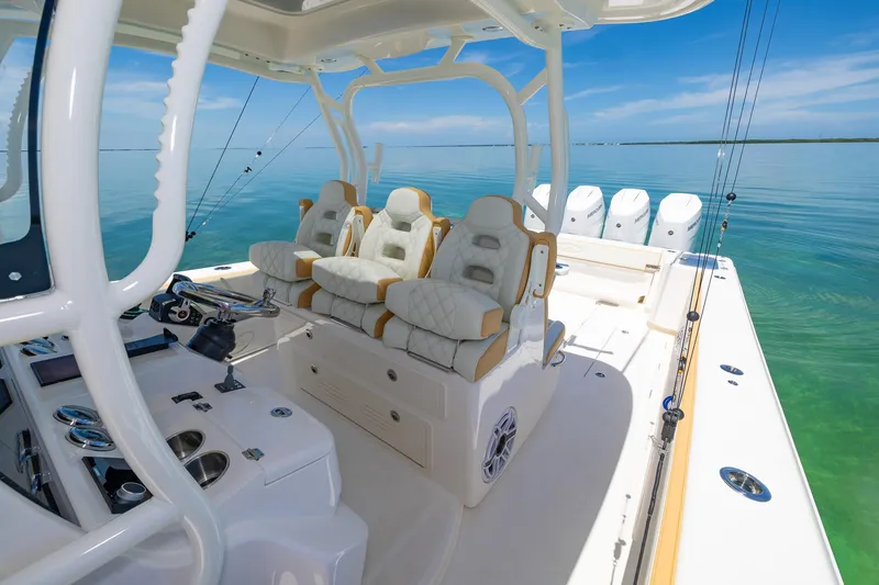 Slide: The Image of 2024 Blackwater 43 Sportfish boat interior with luxury seating and multiple outboard engines. - 24