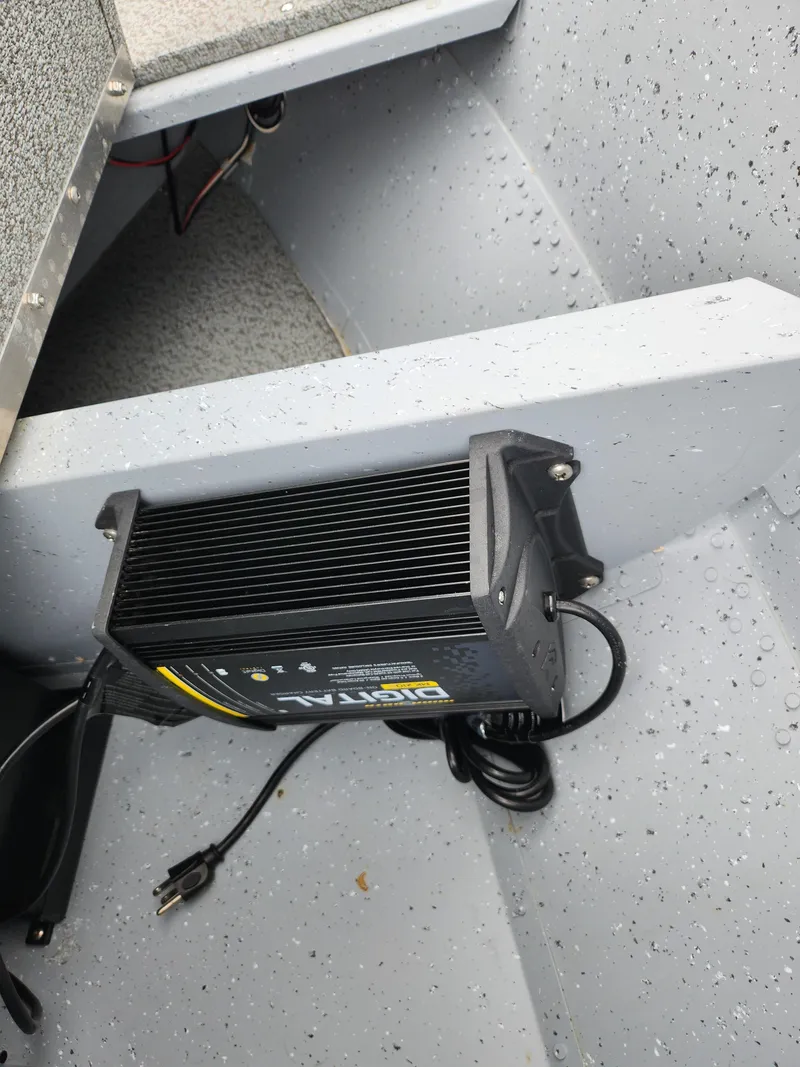 Slide: The Image of 2019 Lund 1600 Fury Tiller boat with onboard battery charger. - 14