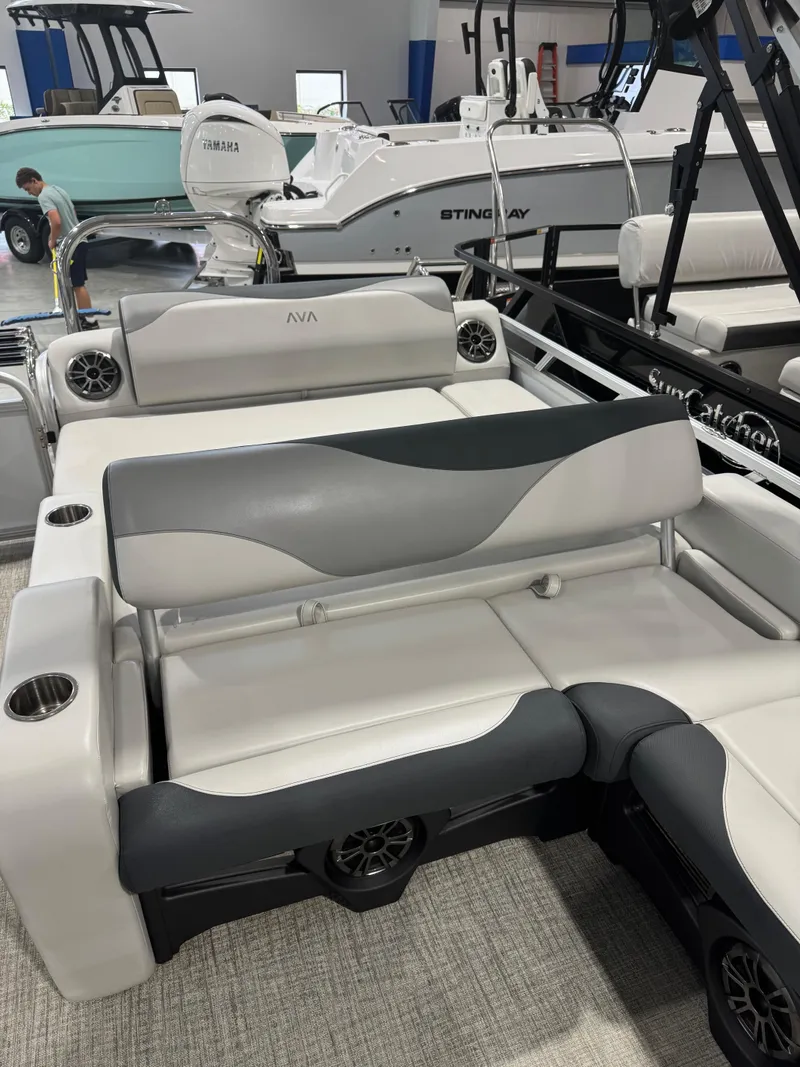 Slide: The Image of 2025 Avalon 2385 25 LSZ VRL pontoon boat interior with stylish seating and cup holders. - 10