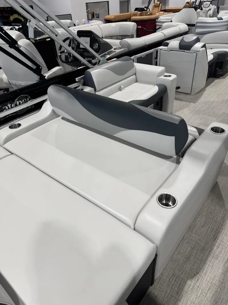 Slide: The Image of 2025 Avalon 2385 25 LSZ VRL pontoon boat interior with sleek seating and cup holders. - 12