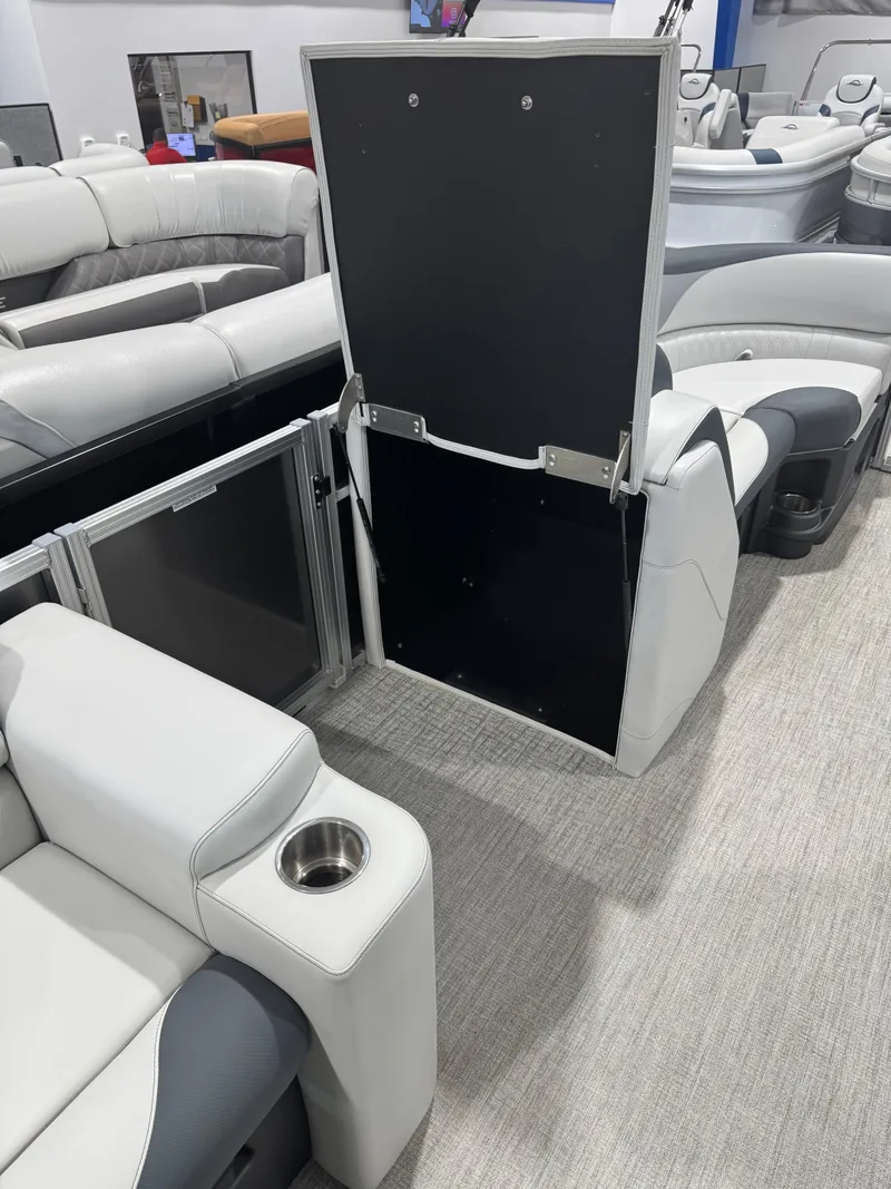 Slide: The Image of 2025 Avalon 2385 25 LSZ VRL pontoon interior with plush seating and cup holder. - 7