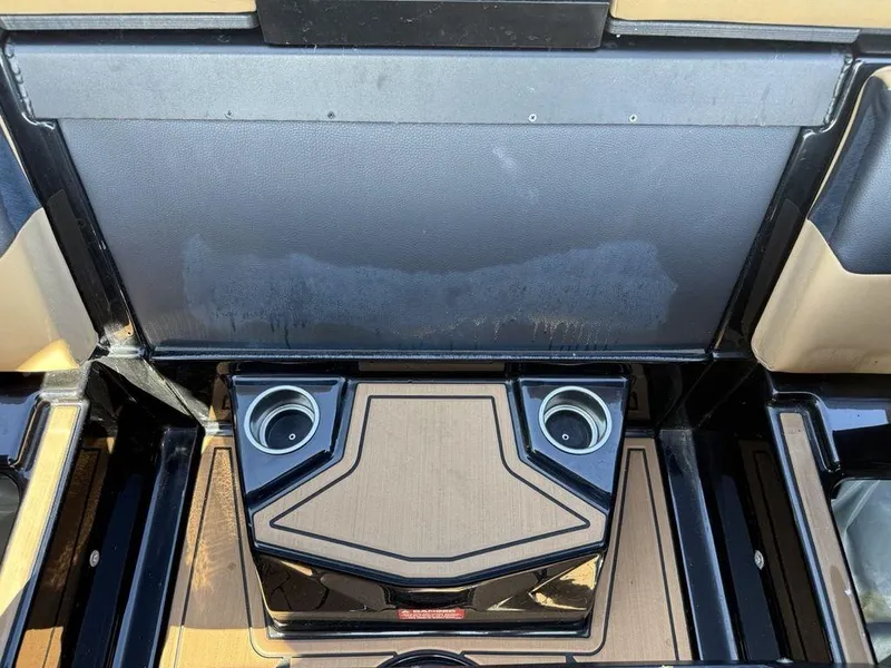 Slide: The Image of 2023 ATX Surf Boats 22 TYPE-S interior with cup holders and sleek design. - 18