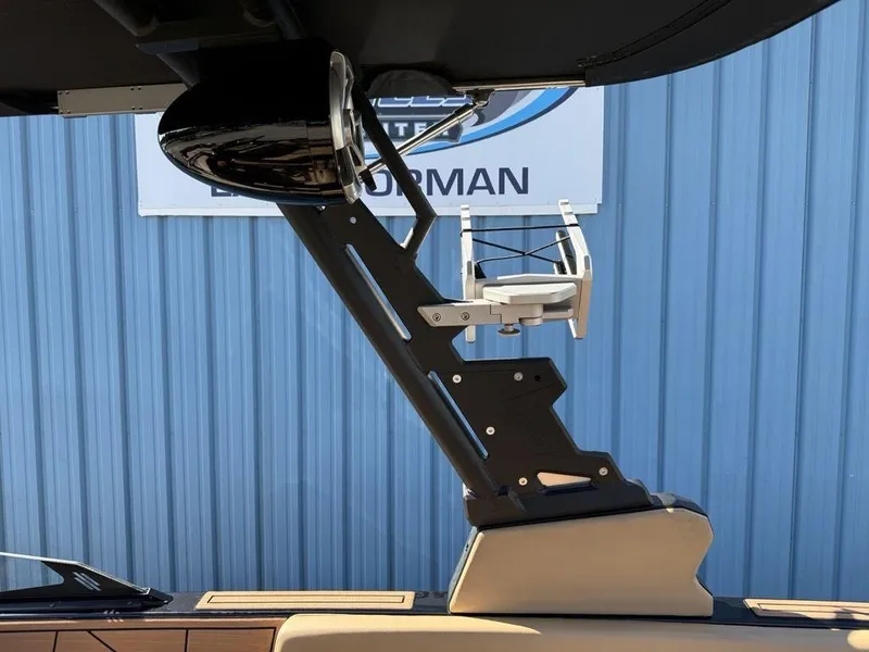 Slide: The Image of 2023 ATX Surf Boats 22 TYPE-S tower and speaker detail against blue wall. - 23