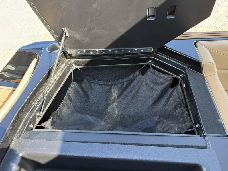 Slide: The Image of Open storage compartment in 2023 ATX Surf Boats 22 TYPE-S. - 24