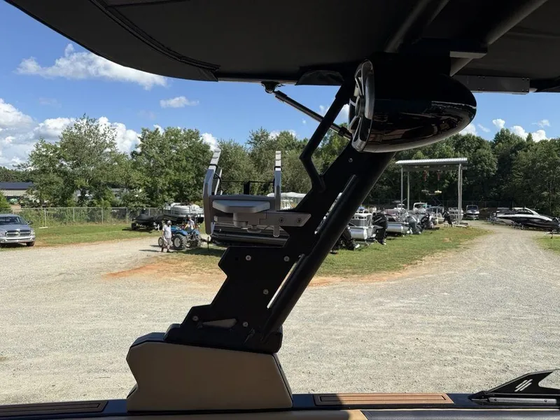 Slide: The Image of 2023 ATX Surf Boats 22 TYPE-S tower and speaker, outdoor setting with boats in background. - 34