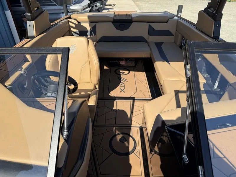 Slide: The Image of 2023 ATX Surf Boats 22 TYPE-S interior with tan seating and sleek design. - 4