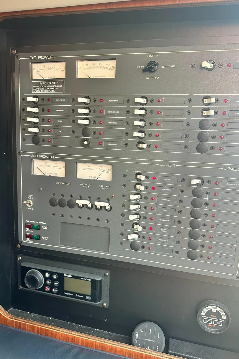 Slide: The Image of Electrical control panel on a 1997 Tiara Yachts 3100 Open boat. - 22