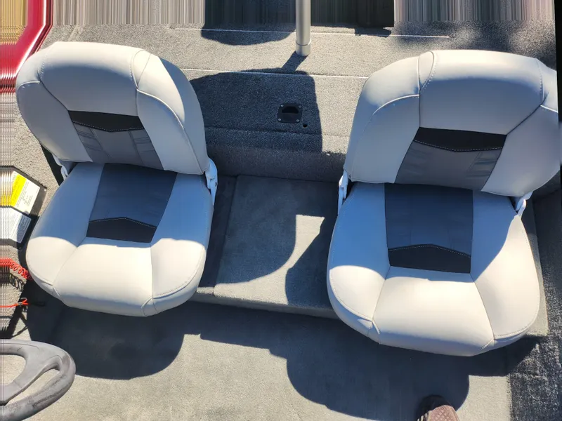 Slide: The Image of 2018 Tracker Pro 170 boat seats, gray and black upholstery, top view. - 18