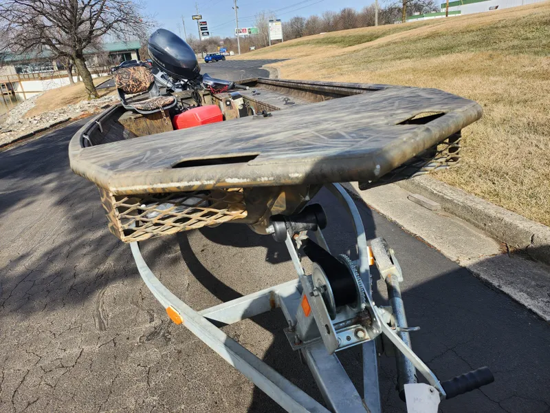 Slide: The Image of 2019 G3 Gator Tough 15 DK boat on trailer, parked on roadside. - 6