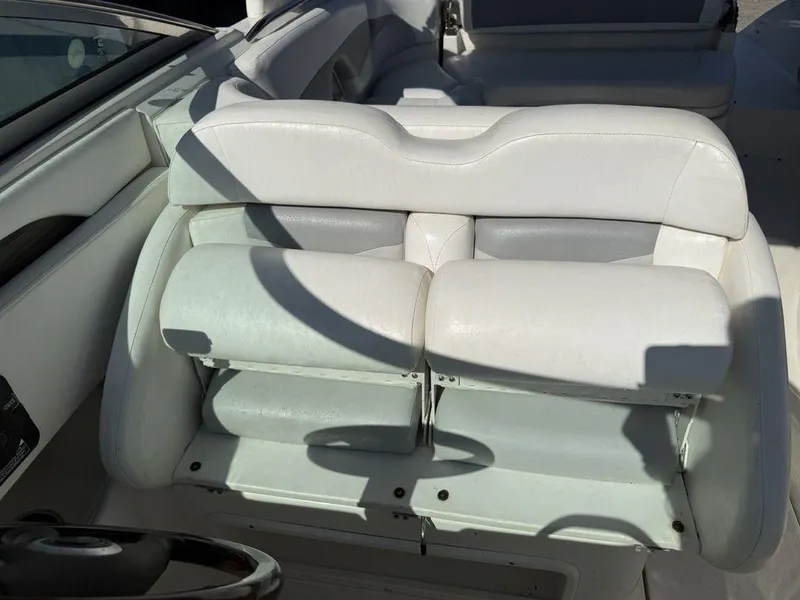 Slide: The Image of 2007 Chaparral 276 SSX boat interior with white leather seating. - 14
