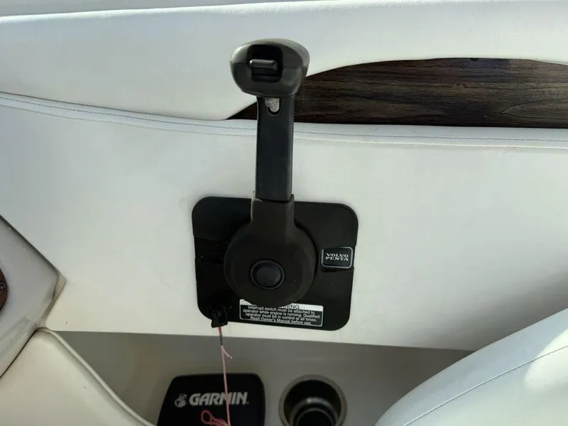 Slide: The Image of Throttle control lever on a 2007 Chaparral 276 SSX boat interior. - 22