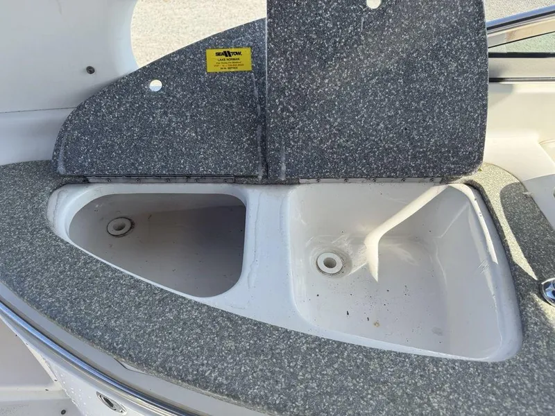 Slide: The Image of 2007 Chaparral 276 SSX boat sink with granite-style countertop. - 24