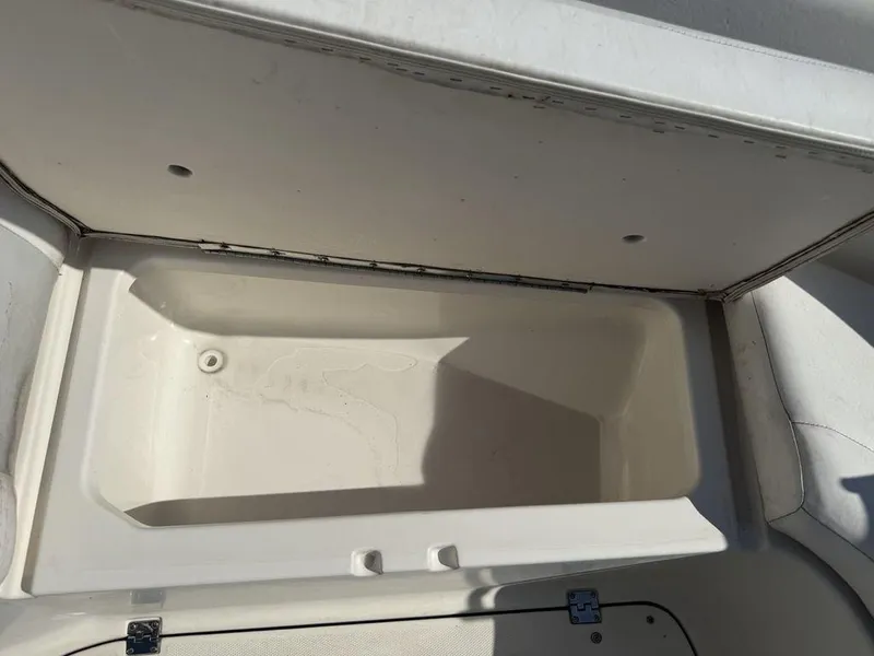 Slide: The Image of Storage compartment in 2007 Chaparral 276 SSX boat, open and empty. - 8