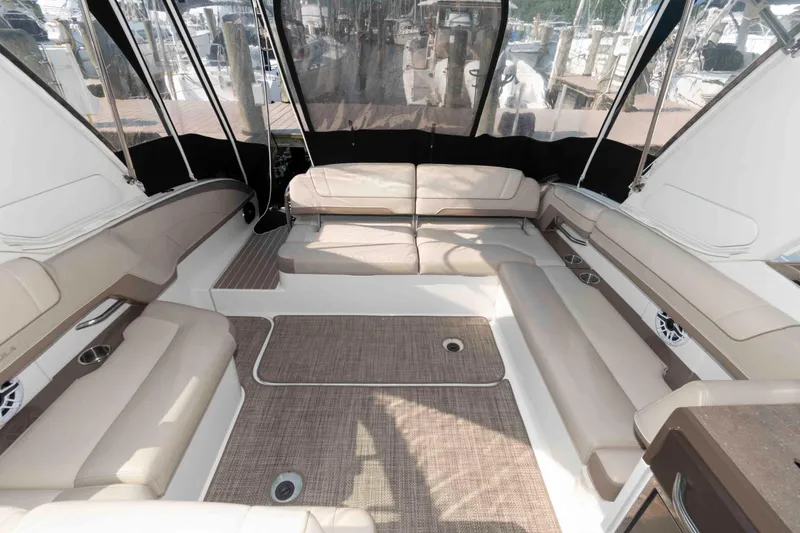 Slide: The Image of 2016 Formula 330 Crossover Bowrider interior with spacious seating and elegant design. - 15