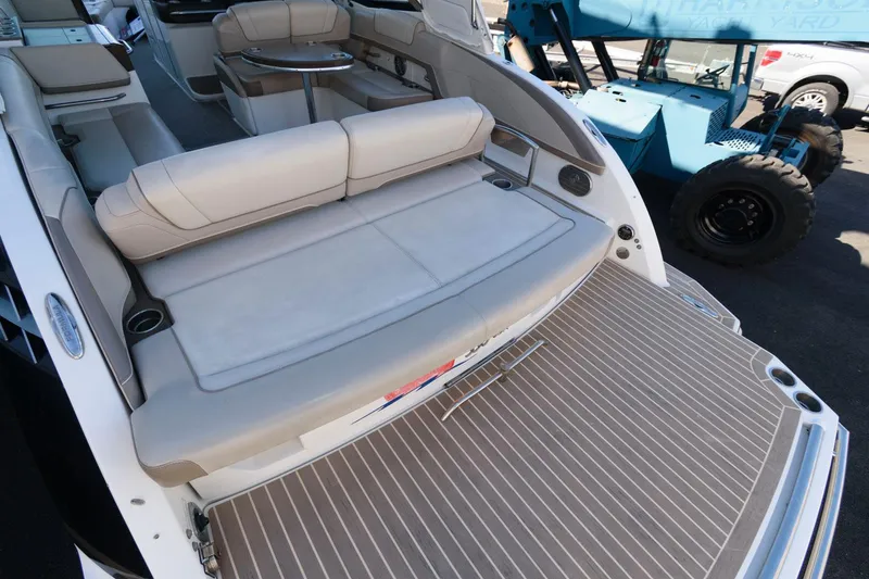 Slide: The Image of 2016 Formula 330 Crossover Bowrider with spacious seating and swim platform. - 6