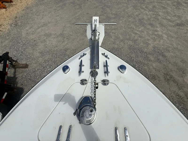 Slide: The Image of Bow view of 2002 Contender 27 Tournament boat with anchor and chain. - 24