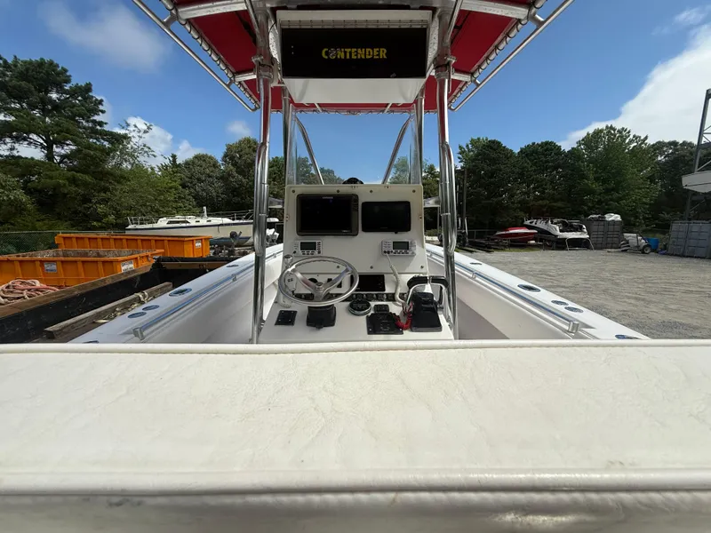 Slide: The Image of 2002 Contender 27 Tournament boat interior with steering console and navigation equipment. - 5