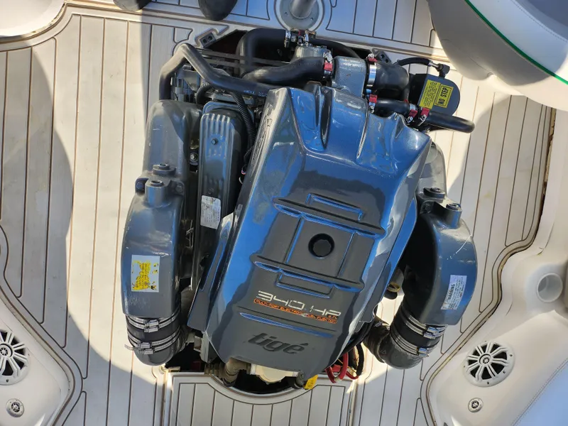 Slide: The Image of 2007 Tigé 22i boat engine, detailed view on deck. - 20
