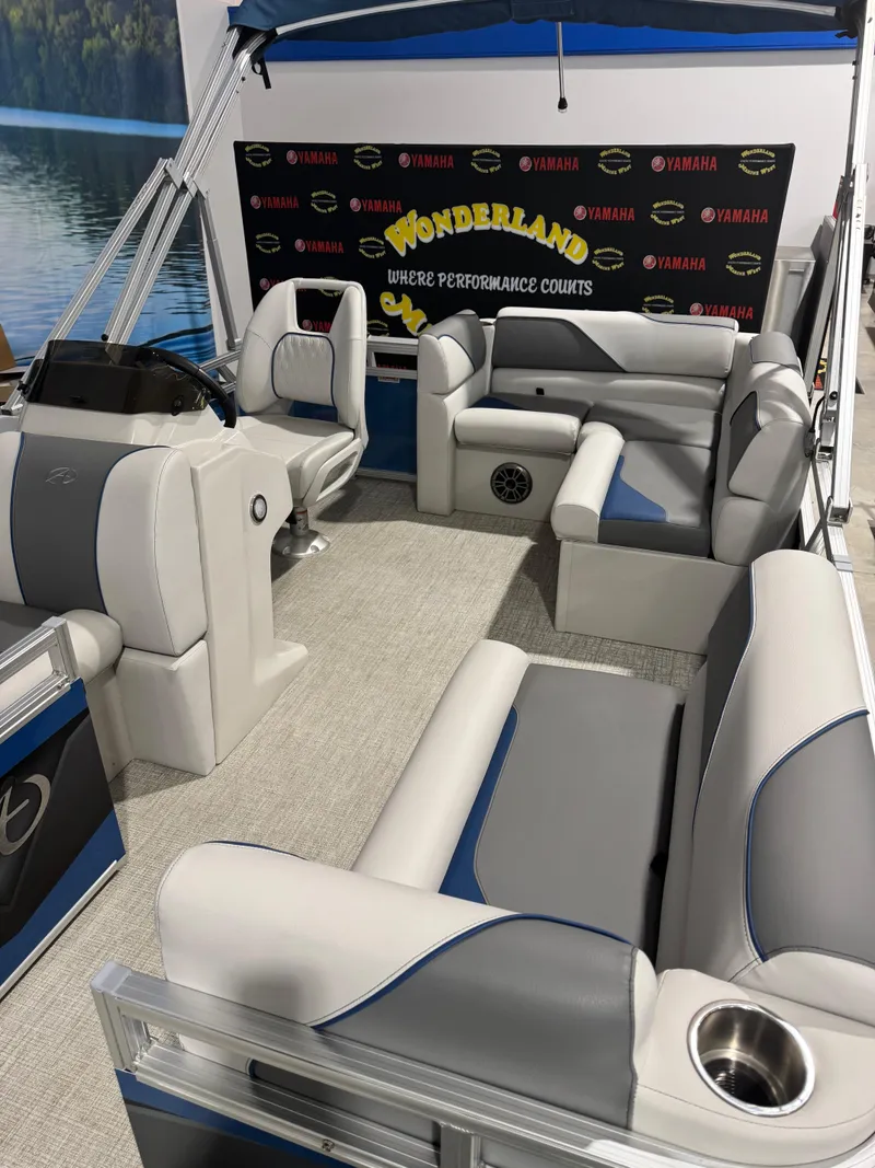 Slide: The Image of 2024 Avalon 1575 23 Venture CR pontoon boat interior with plush seating and modern design. - 3