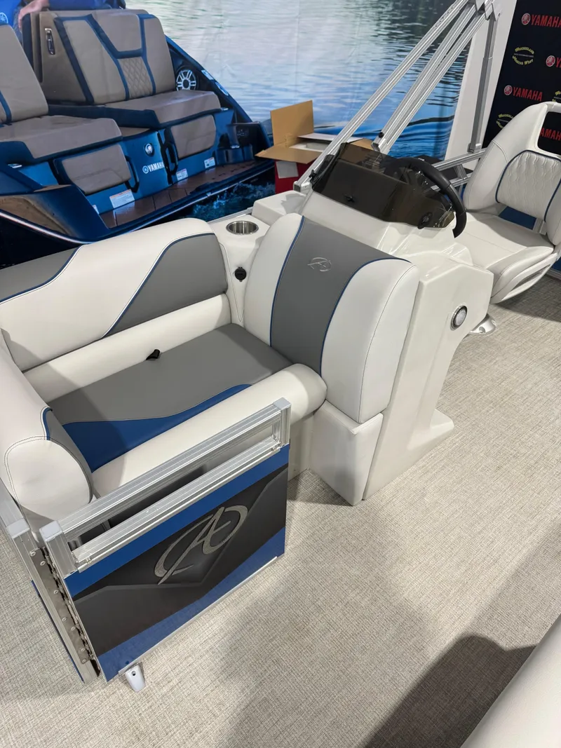 Slide: The Image of 2024 Avalon 1575 23 Venture CR boat interior with modern seating and steering console. - 4