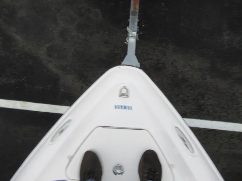 Slide: The Image of Top view of a 2004 Yamaha SX230 boat bow on a trailer. - 16
