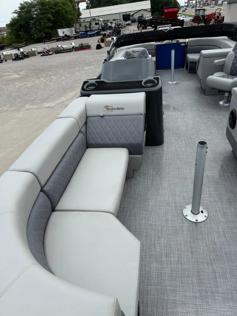 Slide: The Image of 2024 Massimo Marine P 24 LIMITED QUAD pontoon boat with luxurious seating and modern design. - 5
