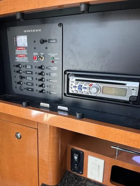 Slide: The Image of Control panel and stereo system inside a 2008 Chaparral Signature 250 boat. - 13