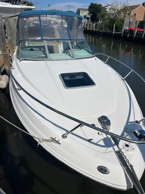 Slide: The Image of 2008 Chaparral Signature 250 boat docked in a marina. - 4