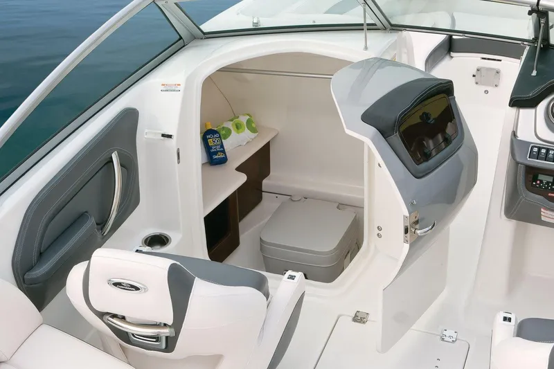 Slide: The Image of Manufacturer Provided Image: 2018 Chaparral 224 Sunesta boat interior with storage and seating. - 10
