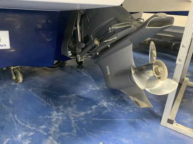 Slide: The Image of 2018 Chaparral 224 Sunesta boat propeller and stern drive on blue floor. - 7