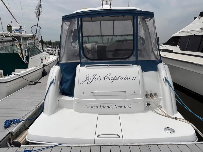 Slide: The Image of 2005 Formula 37 PC boat docked, named "JoJo's Captain II," Staten Island, New York. - 1