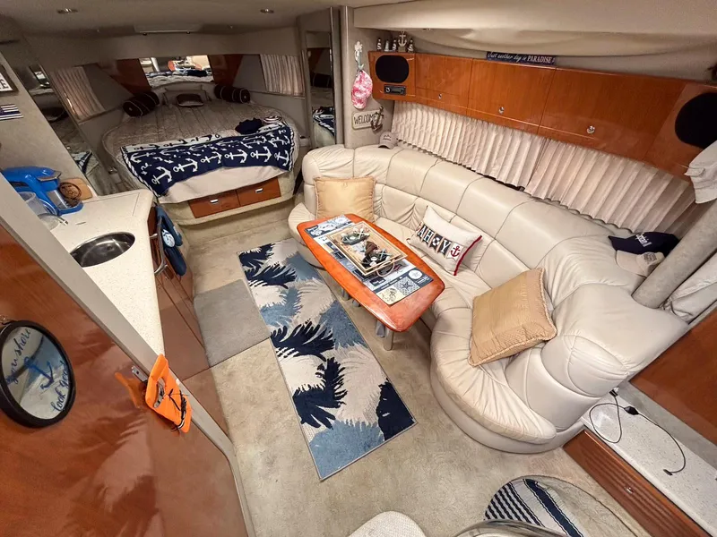 Slide: The Image of Luxurious interior of a 2005 Formula 37 PC yacht with cozy seating and nautical decor. - 10