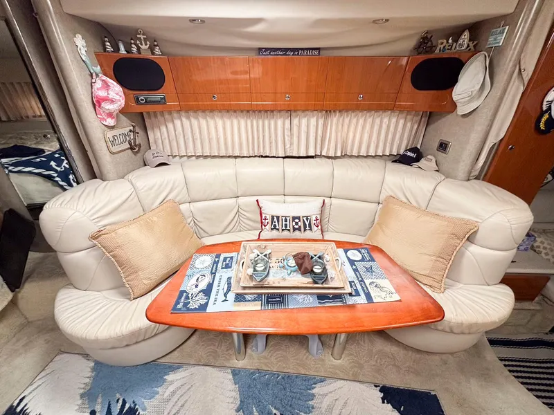 Slide: The Image of Luxurious interior of a 2005 Formula 37 PC yacht with plush seating and nautical decor. - 14