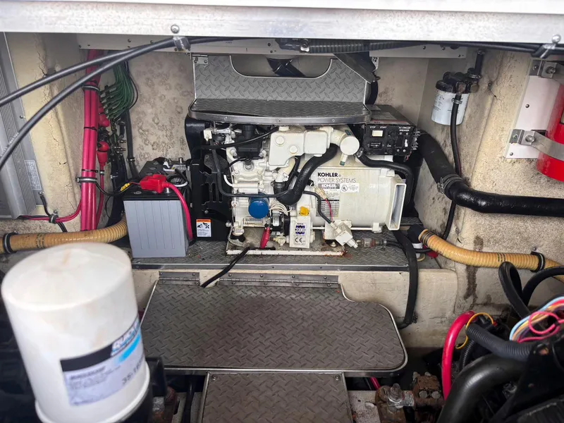 Slide: The Image of Engine compartment of a 2005 Formula 37 PC boat, featuring a Kohler power system. - 22