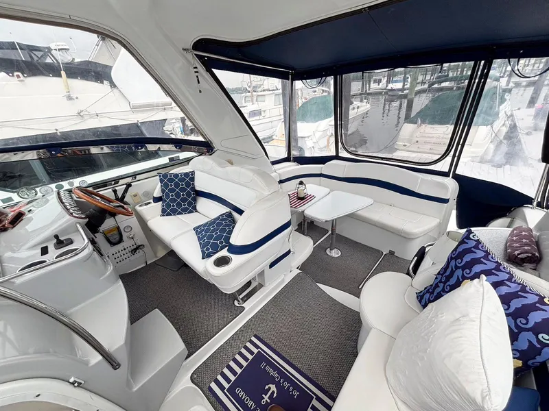 Slide: The Image of Interior of 2005 Formula 37 PC yacht with plush seating and nautical decor. - 4