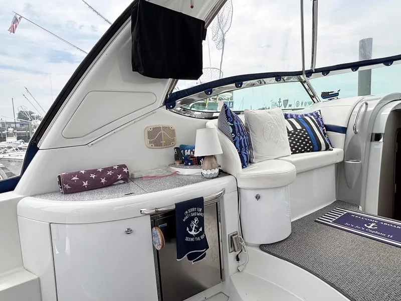 Slide: The Image of 2005 Formula 37 PC yacht interior with cozy seating and nautical decor. - 6