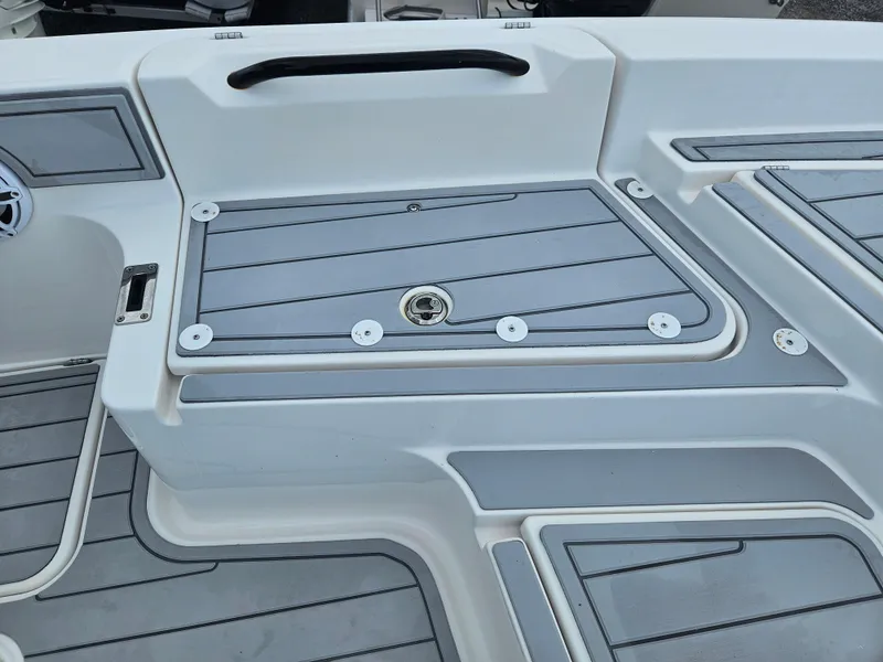 Slide: The Image of 2022 Sea Cat 260 Hybrid boat deck with sleek gray and white design. - 13