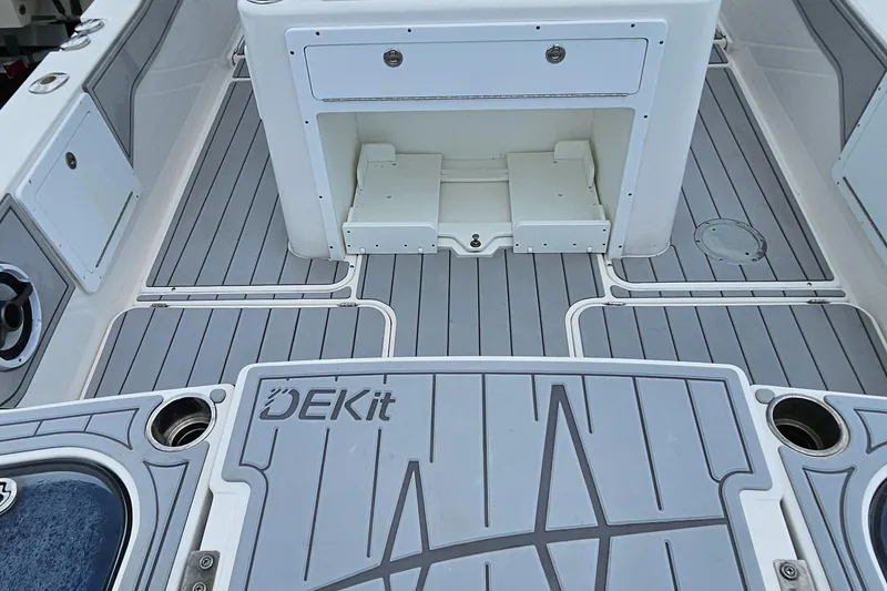 Slide: The Image of Deck of 2022 Sea Cat 260 Hybrid boat with DEKit flooring. - 21