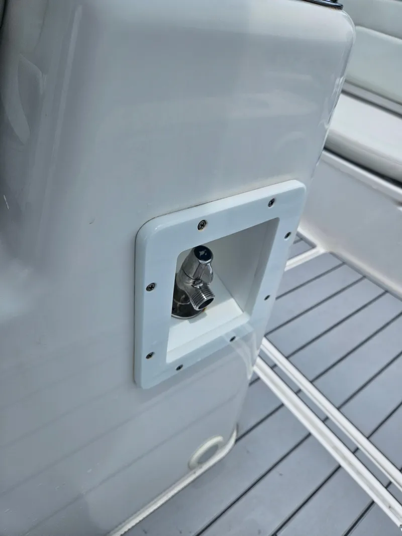 Slide: The Image of Sea Cat 260 Hybrid 2022 boat detail showing a metal fitting on deck. - 23
