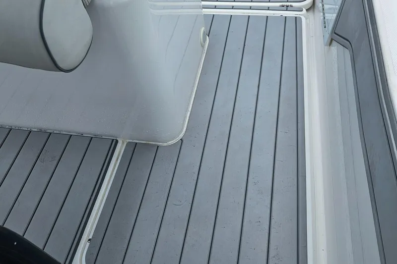 Slide: The Image of 2022 Sea Cat 260 Hybrid boat deck with sleek gray flooring. - 29