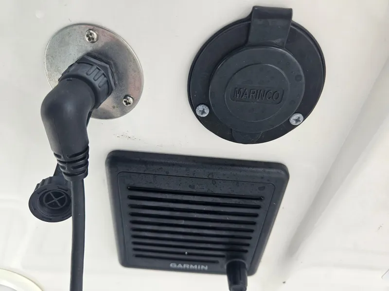 Slide: The Image of Close-up of electrical connections on a 2022 Sea Cat 260 Hybrid boat. - 37