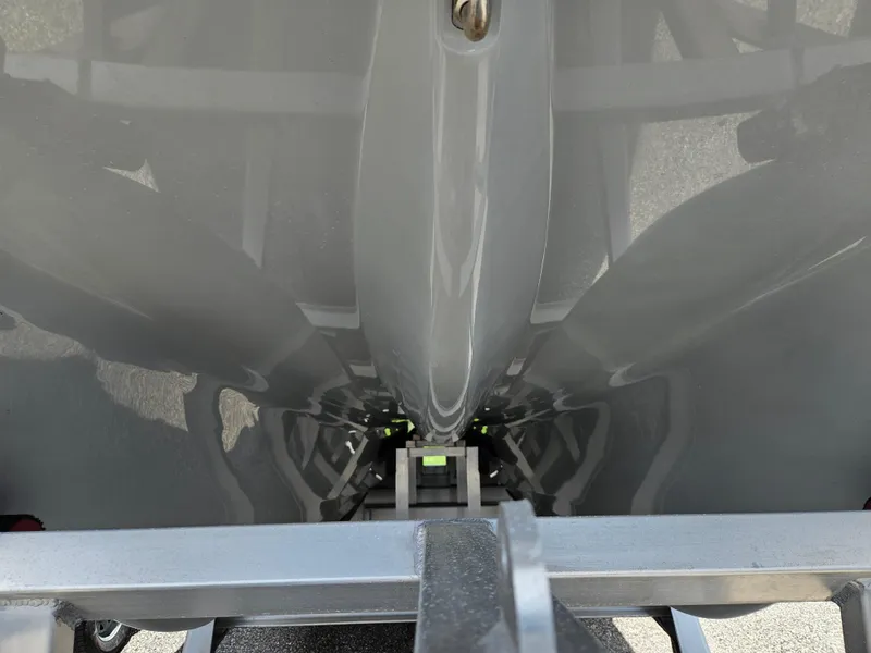 Slide: The Image of Bottom view of 2022 Sea Cat 260 Hybrid boat hull on trailer. - 42