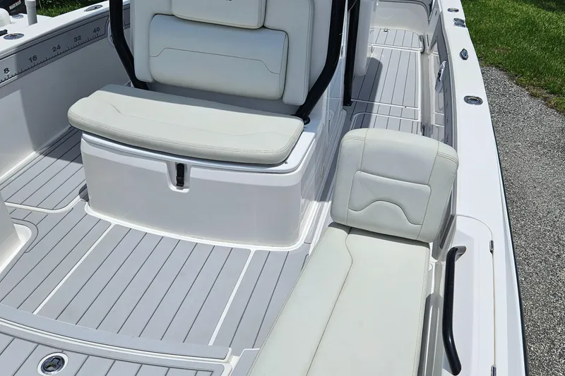 Slide: The Image of 2022 Sea Cat 260 Hybrid boat interior with cushioned seating and sleek design. - 9