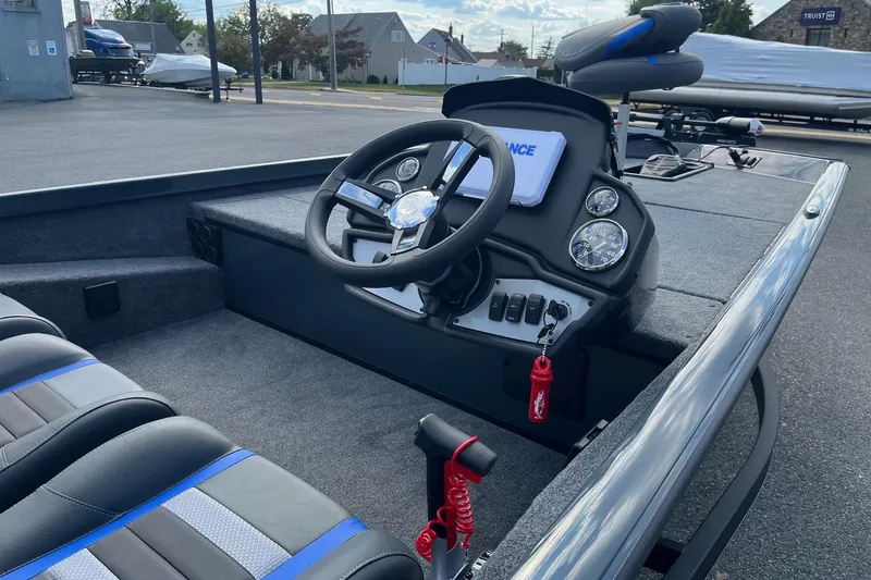 Slide: The Image of 2026 Ranger RT188 boat interior with steering wheel and control panel. - 4